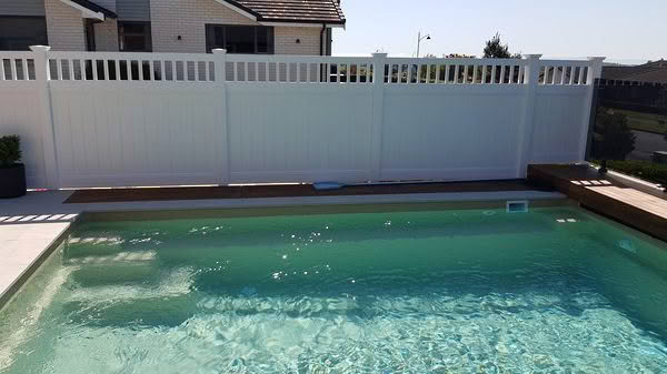 Epsom PVC privacy fence with trellis top, 1830mm high x 2400mm wide panel. Available in white or with grey insert panels. Side profile design, stylish and neighbour friendly.