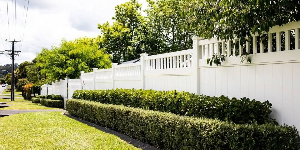 Durafence maintenance-free PVC fencing along a New Zealand property, durable and colour-fast with no painting or rotting required